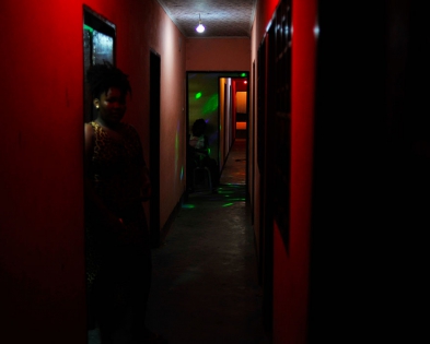  
Sex workers waiting for clients at an hostel, Douala, Cameroon